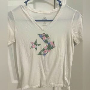 White converse tee with floral logo